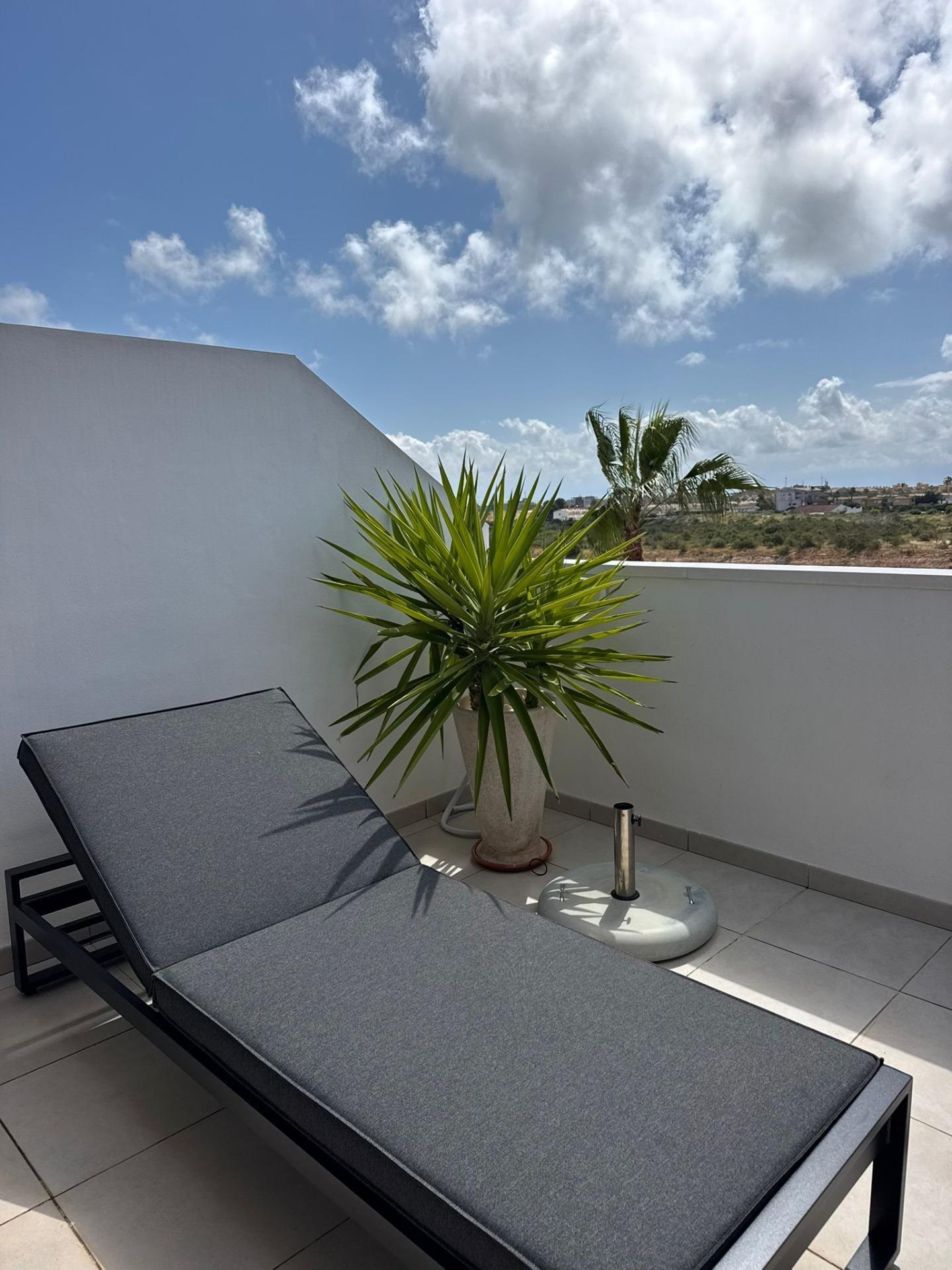 Pool area in duplex for sale in Orihuela Costa