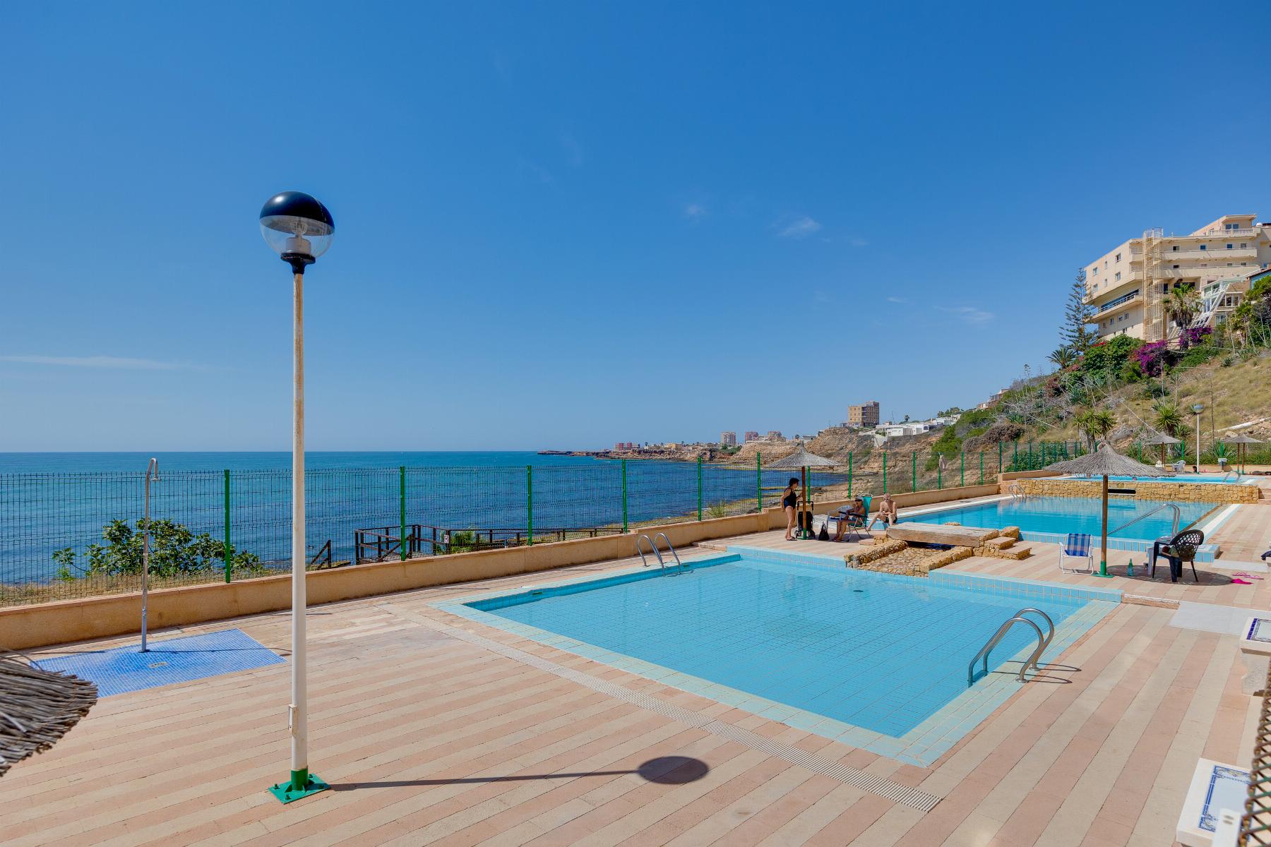 Pool area in apartment for sale in Torrevieja