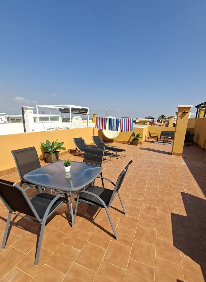 Living room in penthouse for sale in Orihuela