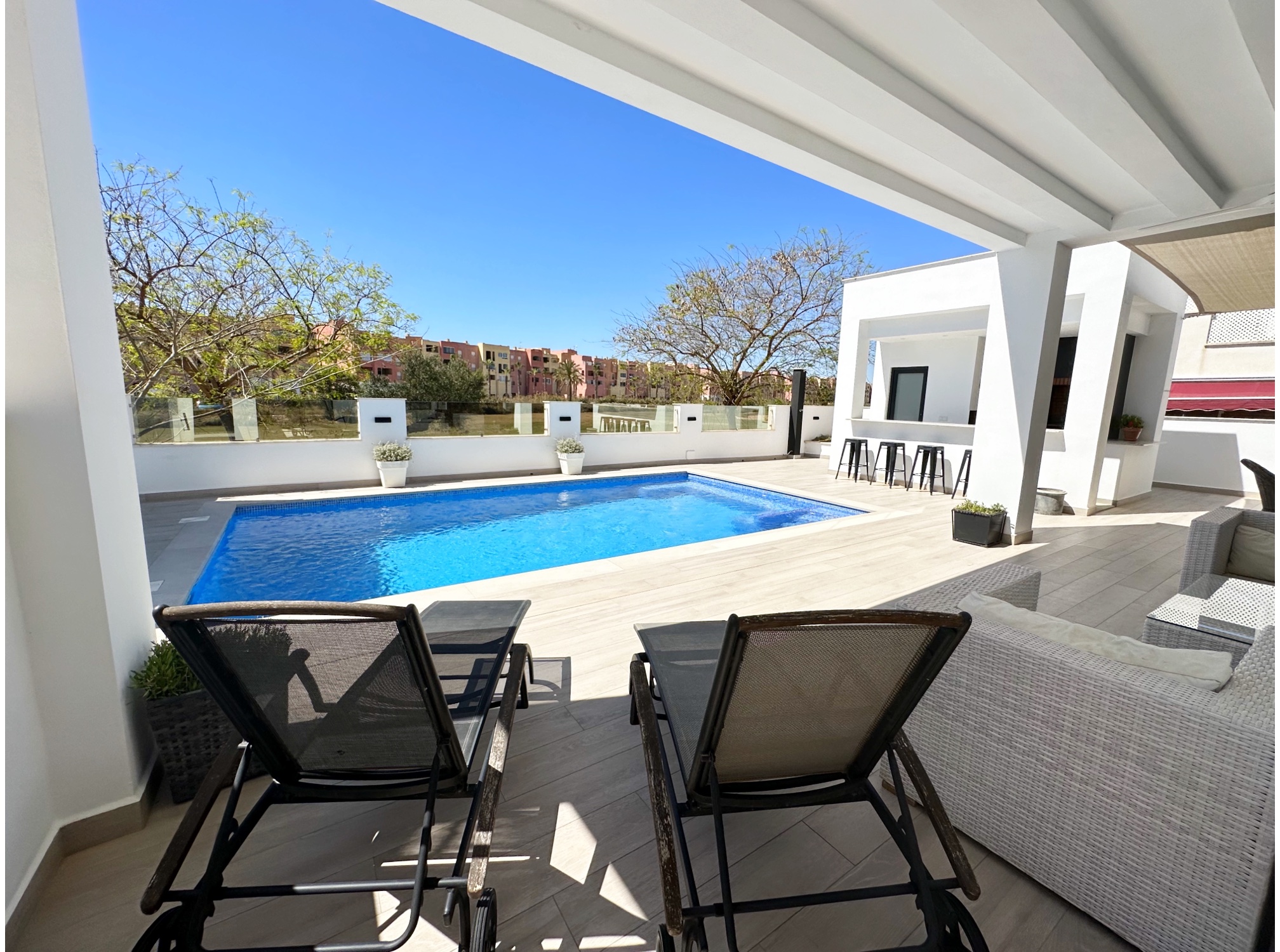 Pool area in villa for sale in Mar Menor Golf Resort