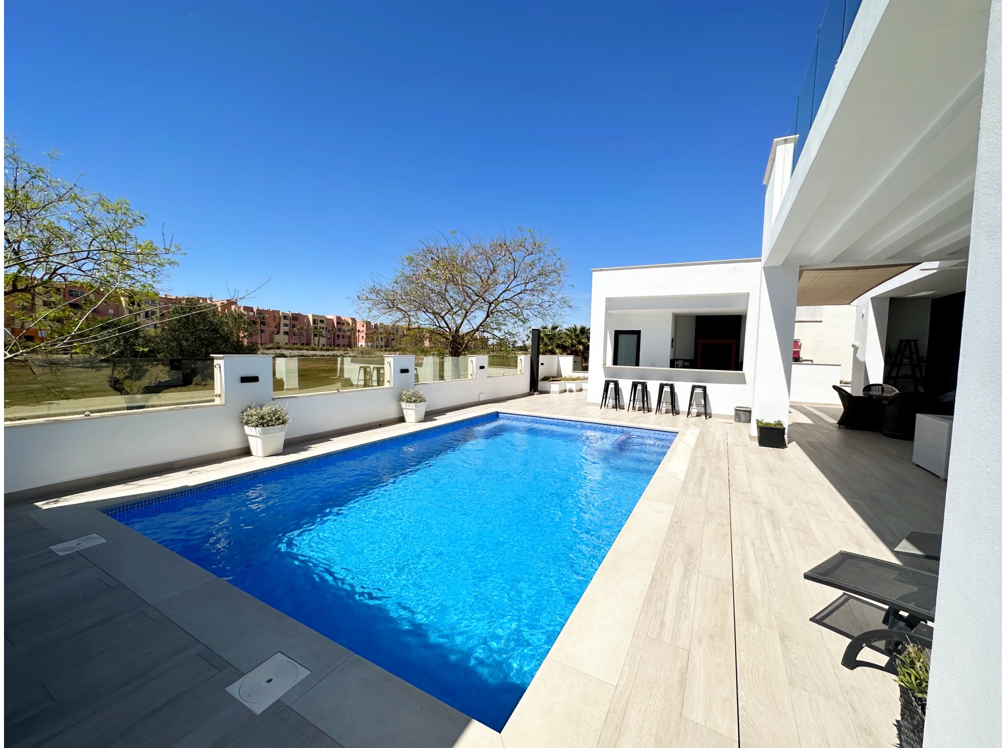 Pool area in villa for sale in Mar Menor Golf Resort