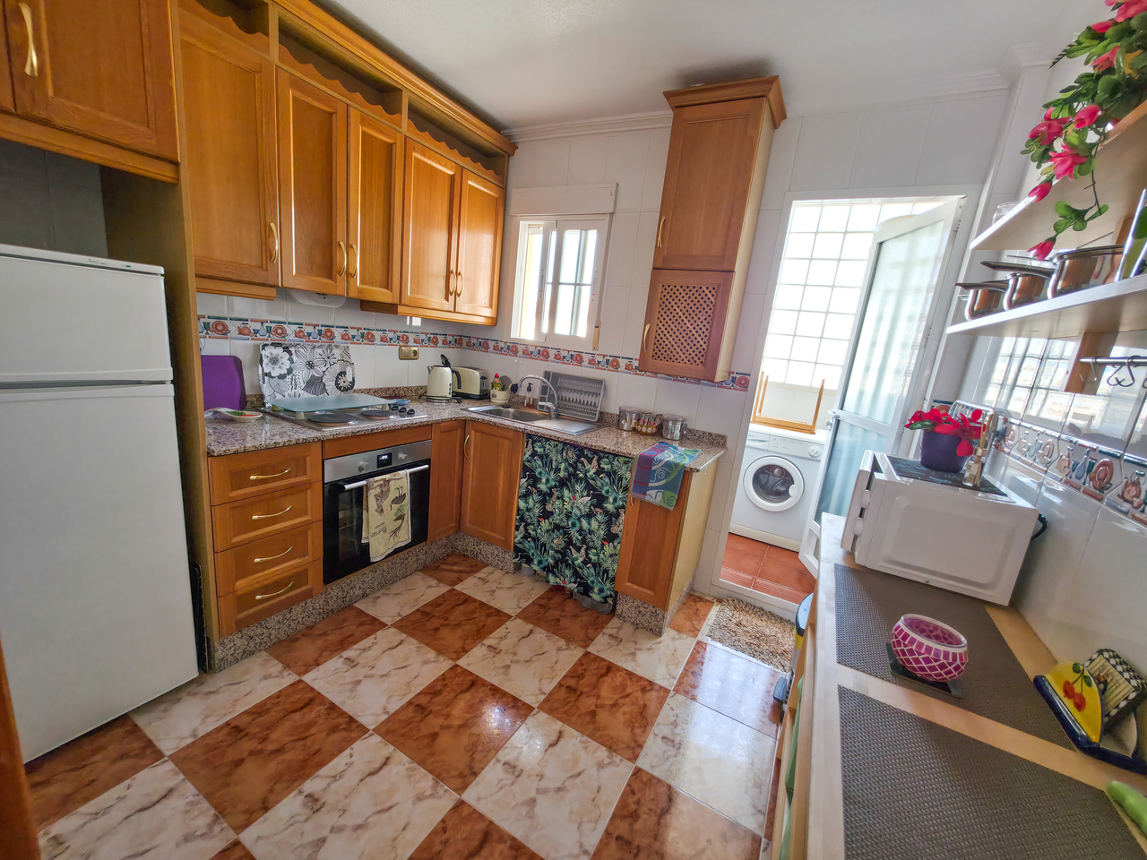 Pool area in apartment for sale in Cabo Roig