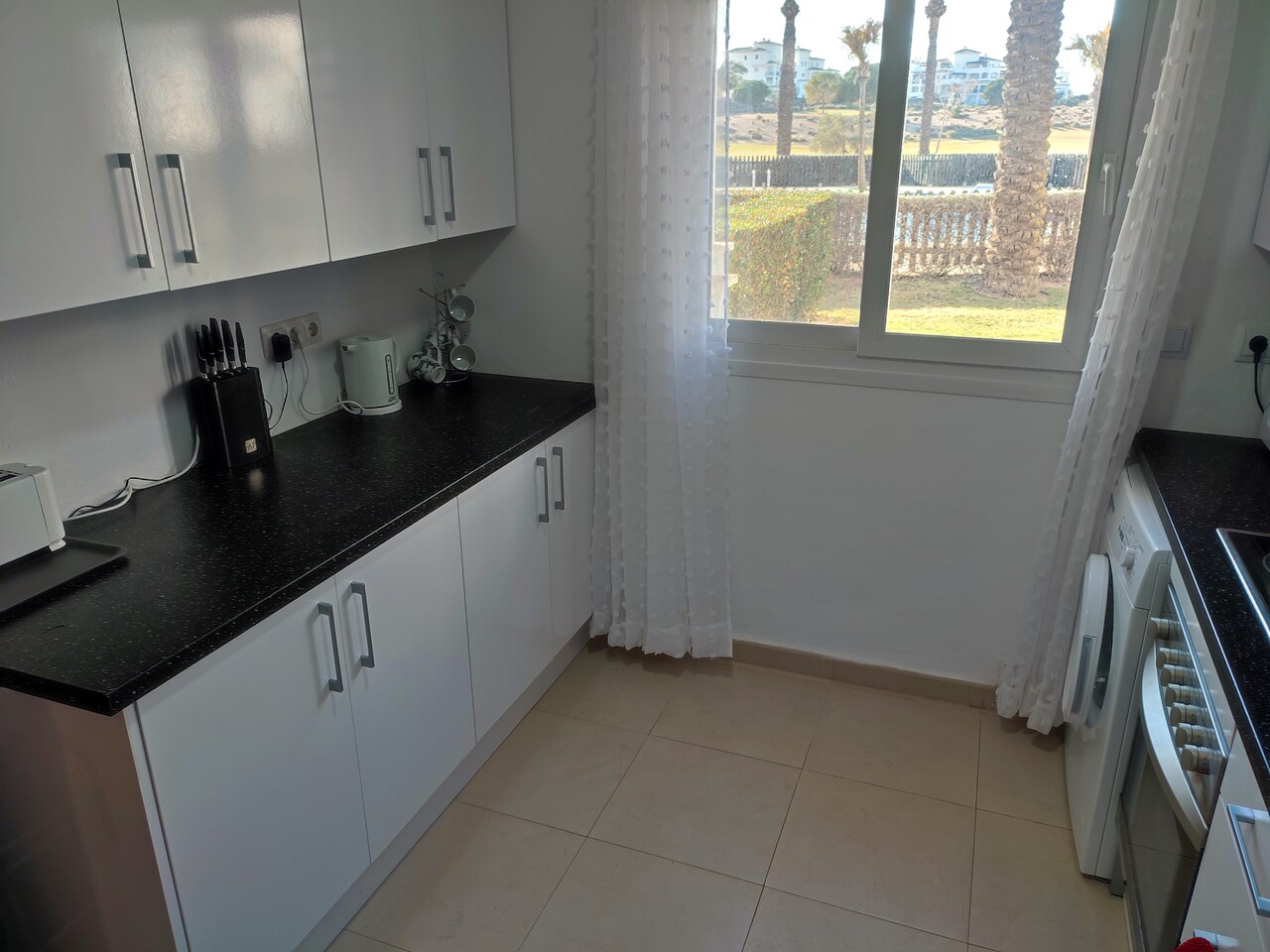 Living room in apartment for sale in Hacienda Riquelme Golf Resort