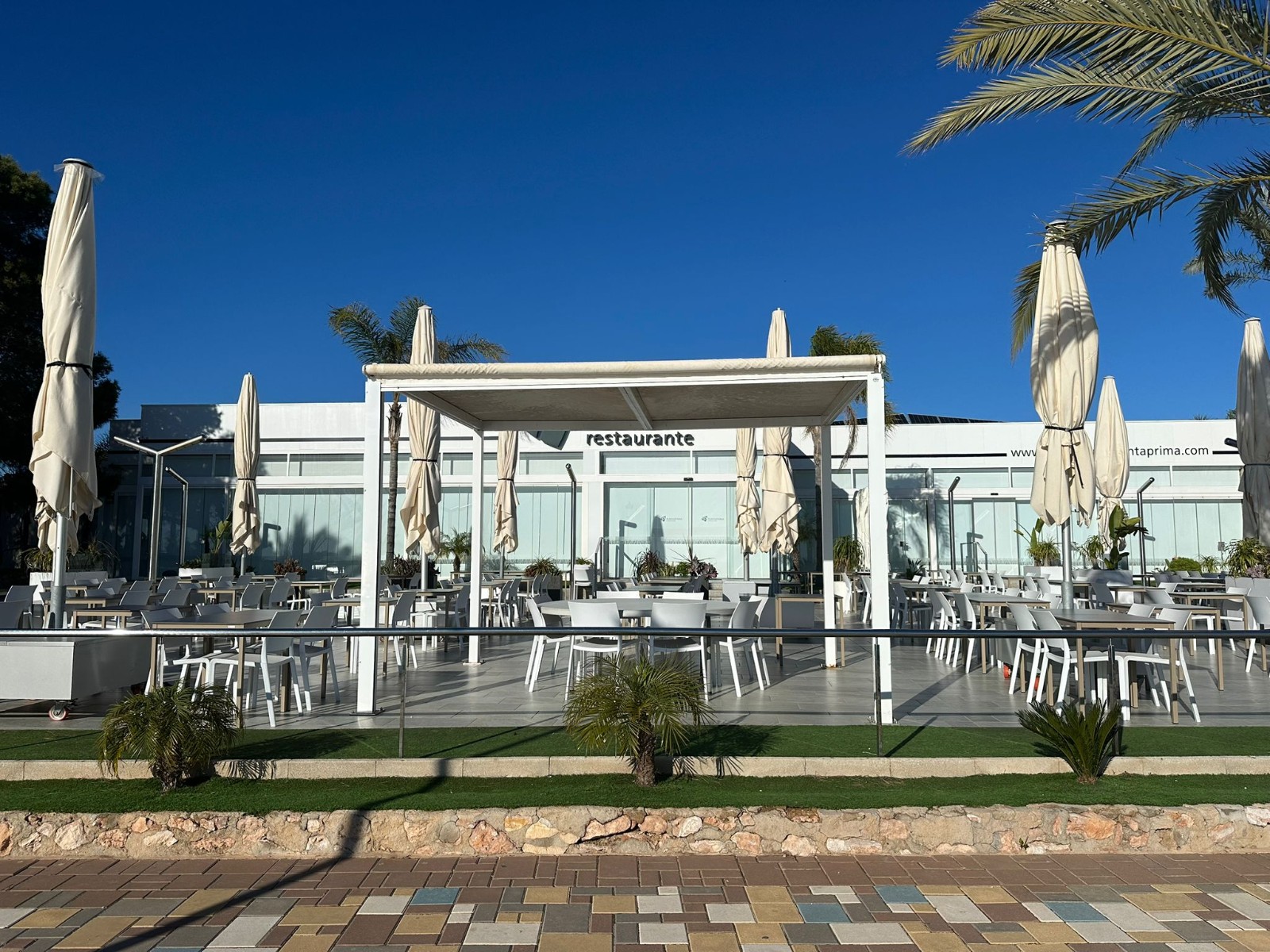Pool area in apartment for sale in Punta Prima