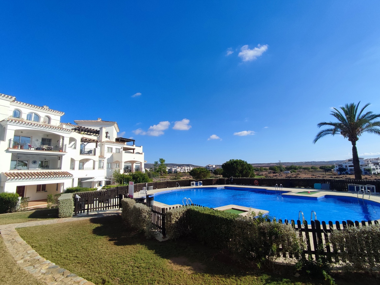 Pool area in apartment for sale in Hacienda Riquelme Golf Resort