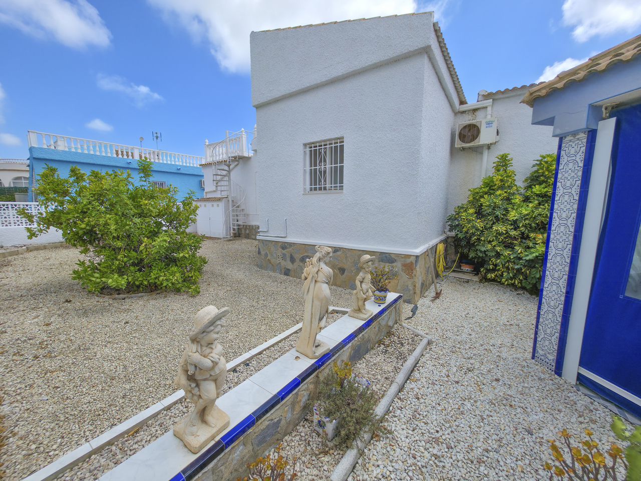 Pool area in villa for sale in Torrevieja