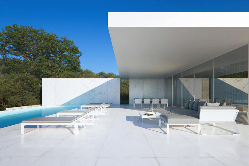 Exclusive designer villa located in Moraira, near El Portet, with spectacular panoramic views of the sea and the surrounding natural landscape