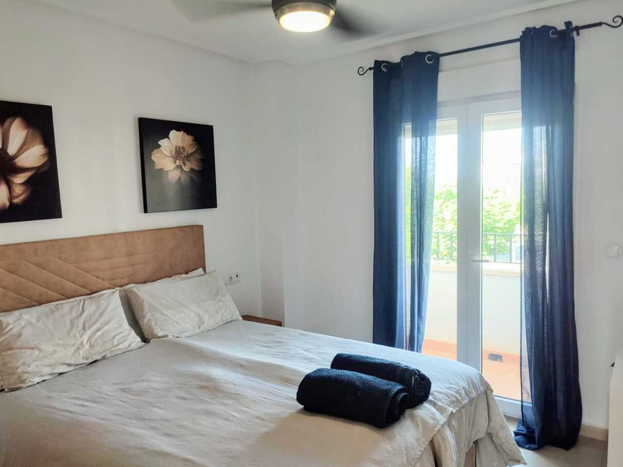 Master bedroom in apartment for sale in Hacienda Riquelme Golf Resort