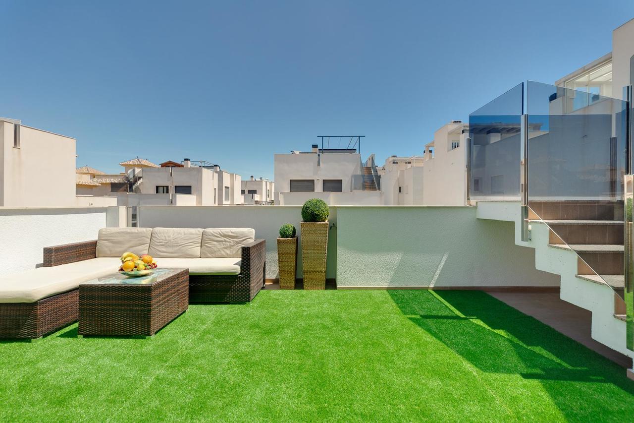 Pool area in villa for sale in Torrevieja