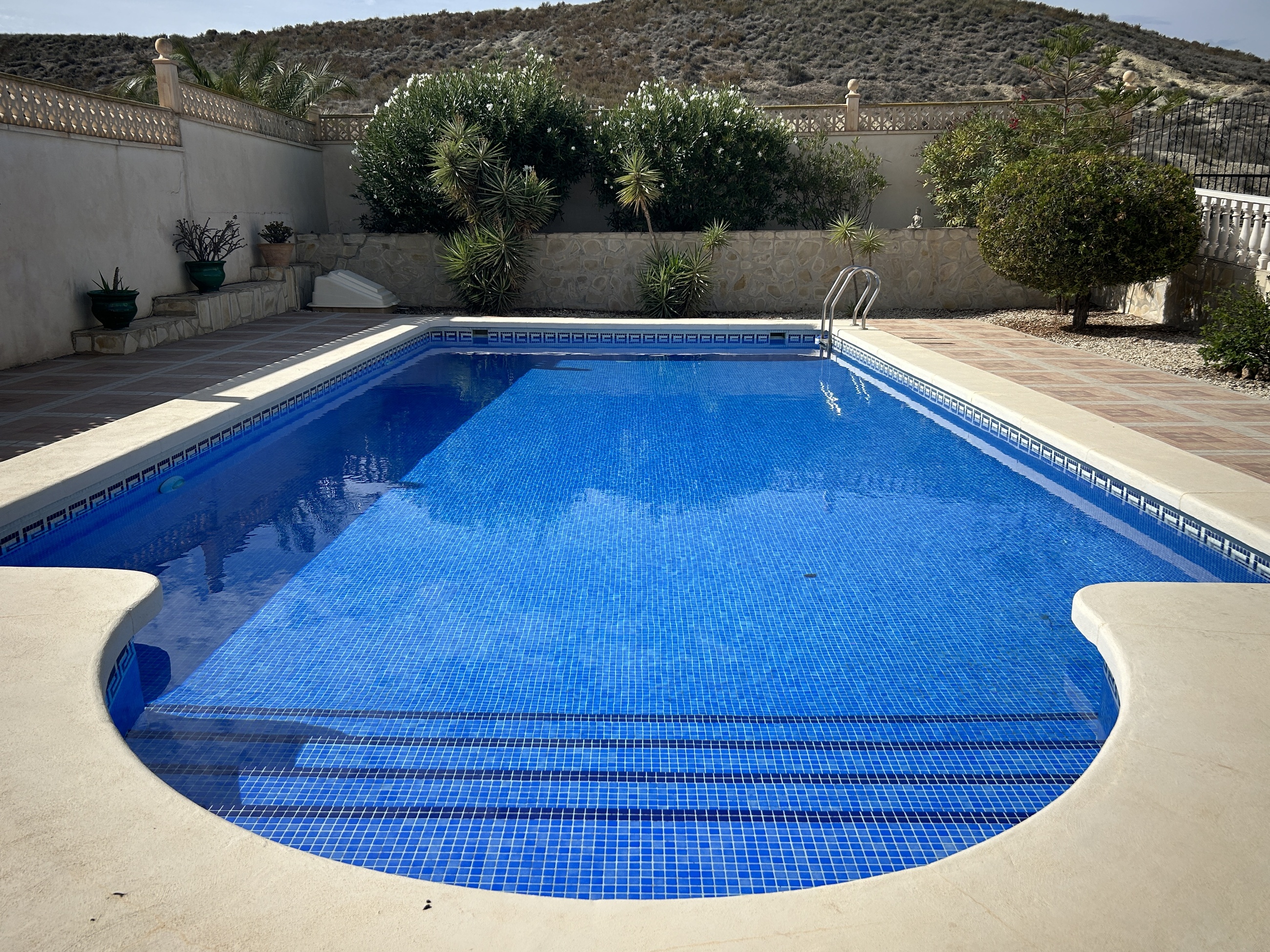 Pool area in villa for sale in Camposol