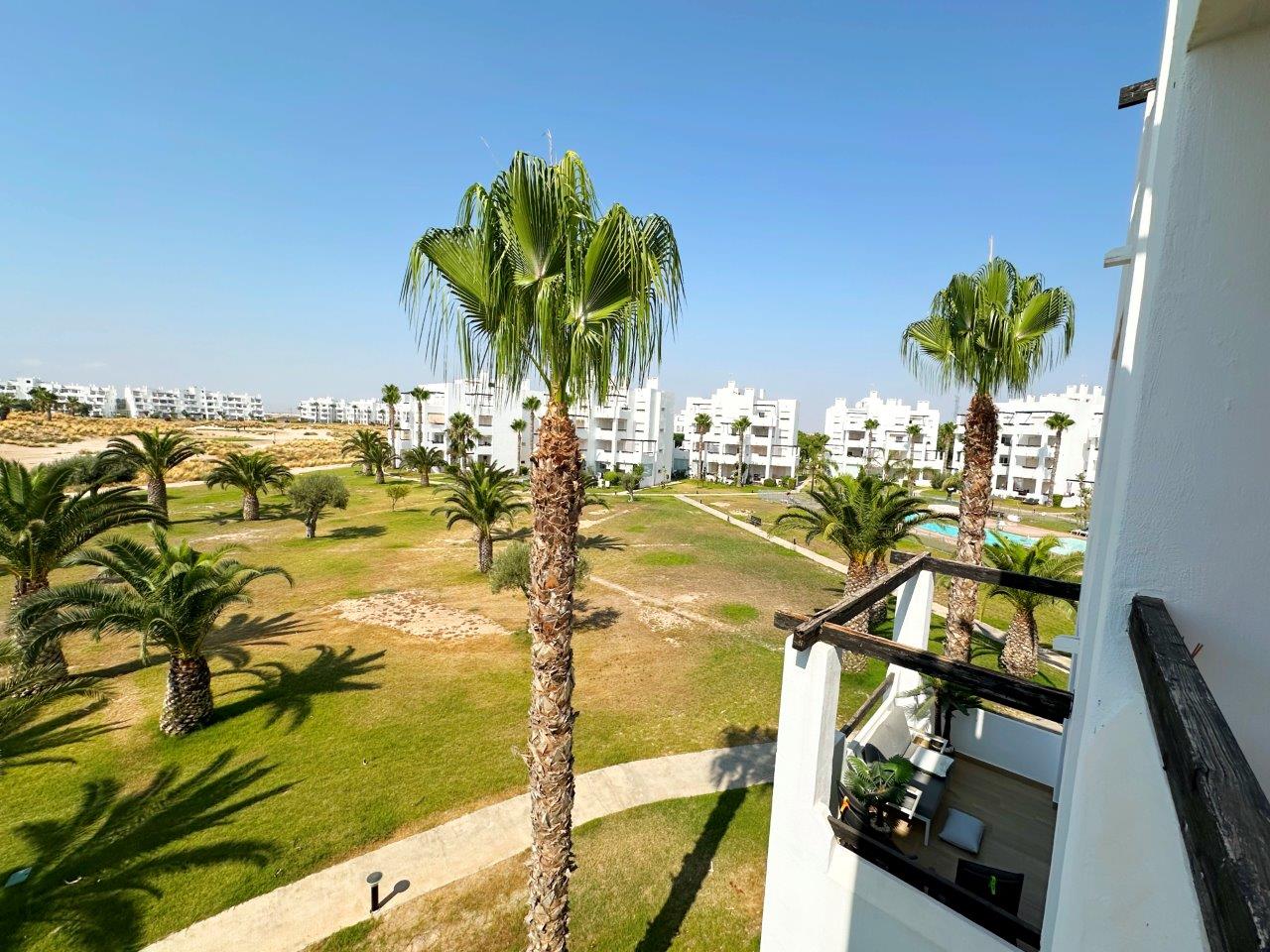 Pool area in apartment for sale in Las Terrazas de la Torre Golf Resort