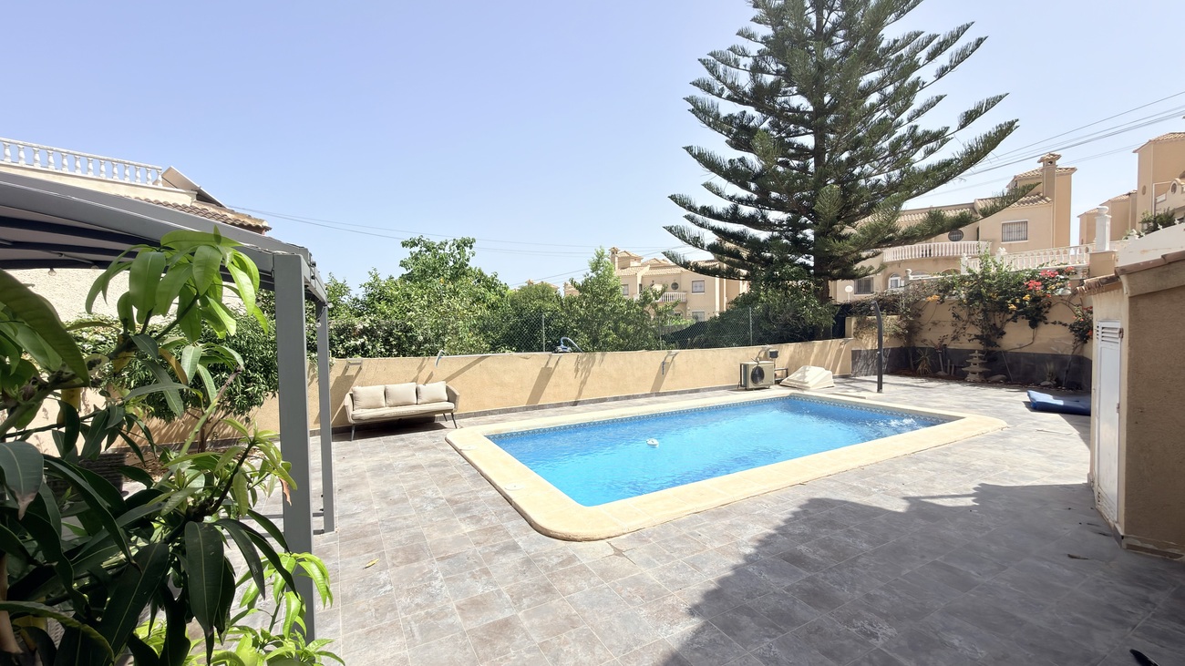 Pool area in villa for sale in Orihuela Costa