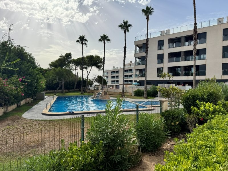 This property is located in La Mata, a residential complex with a communal swimming pool