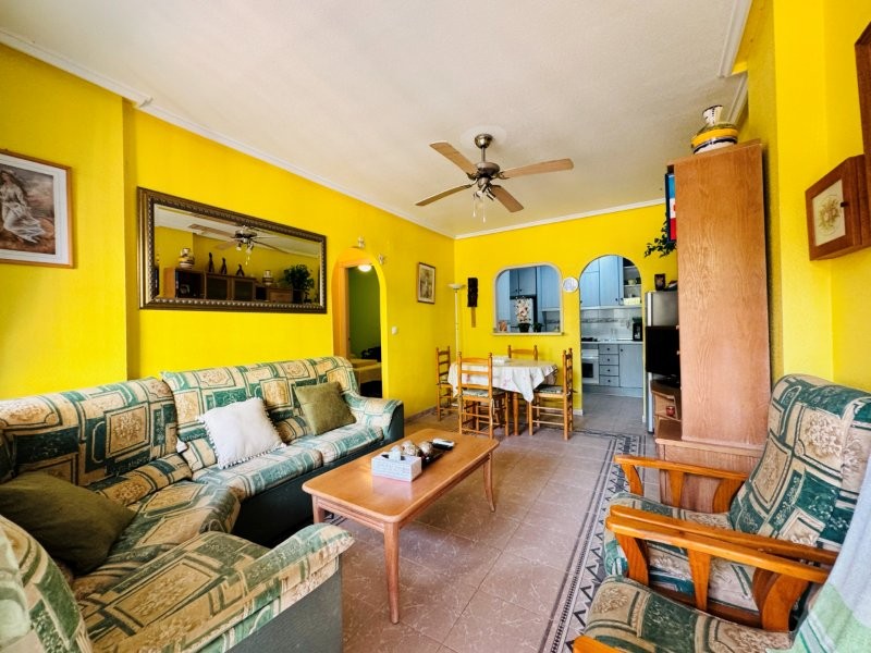 This property is located in La Mata, a residential complex with a communal swimming pool