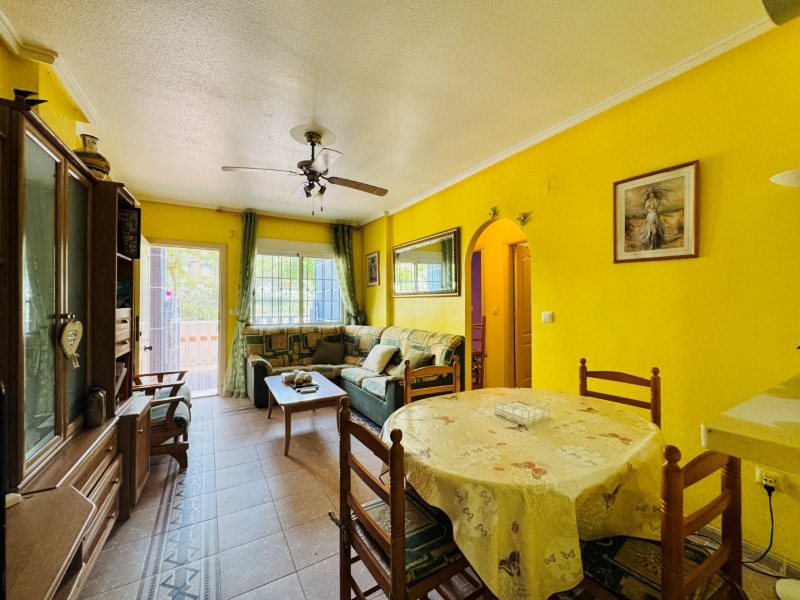 This property is located in La Mata, a residential complex with a communal swimming pool