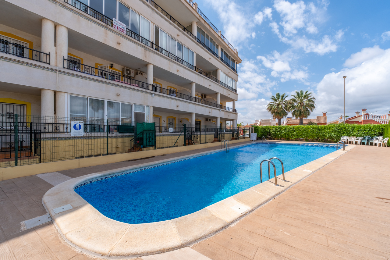 Pool area in apartment for sale in Playa Flamenca