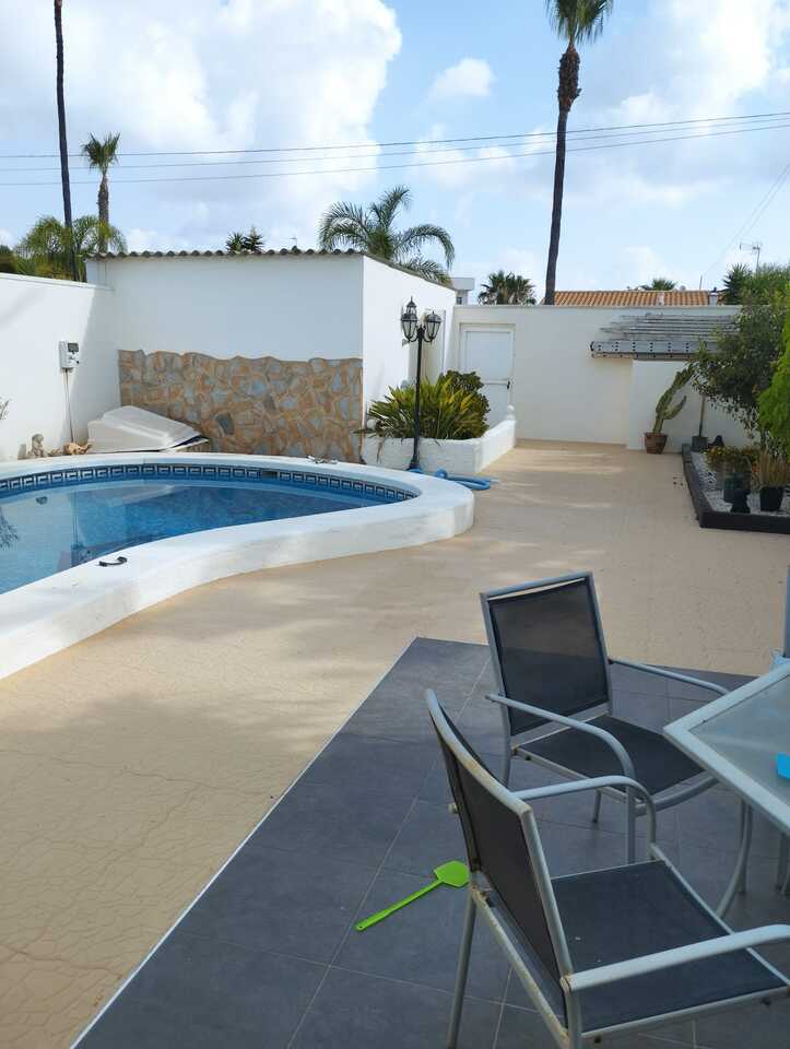 Living room in villa for sale in Cabo Roig