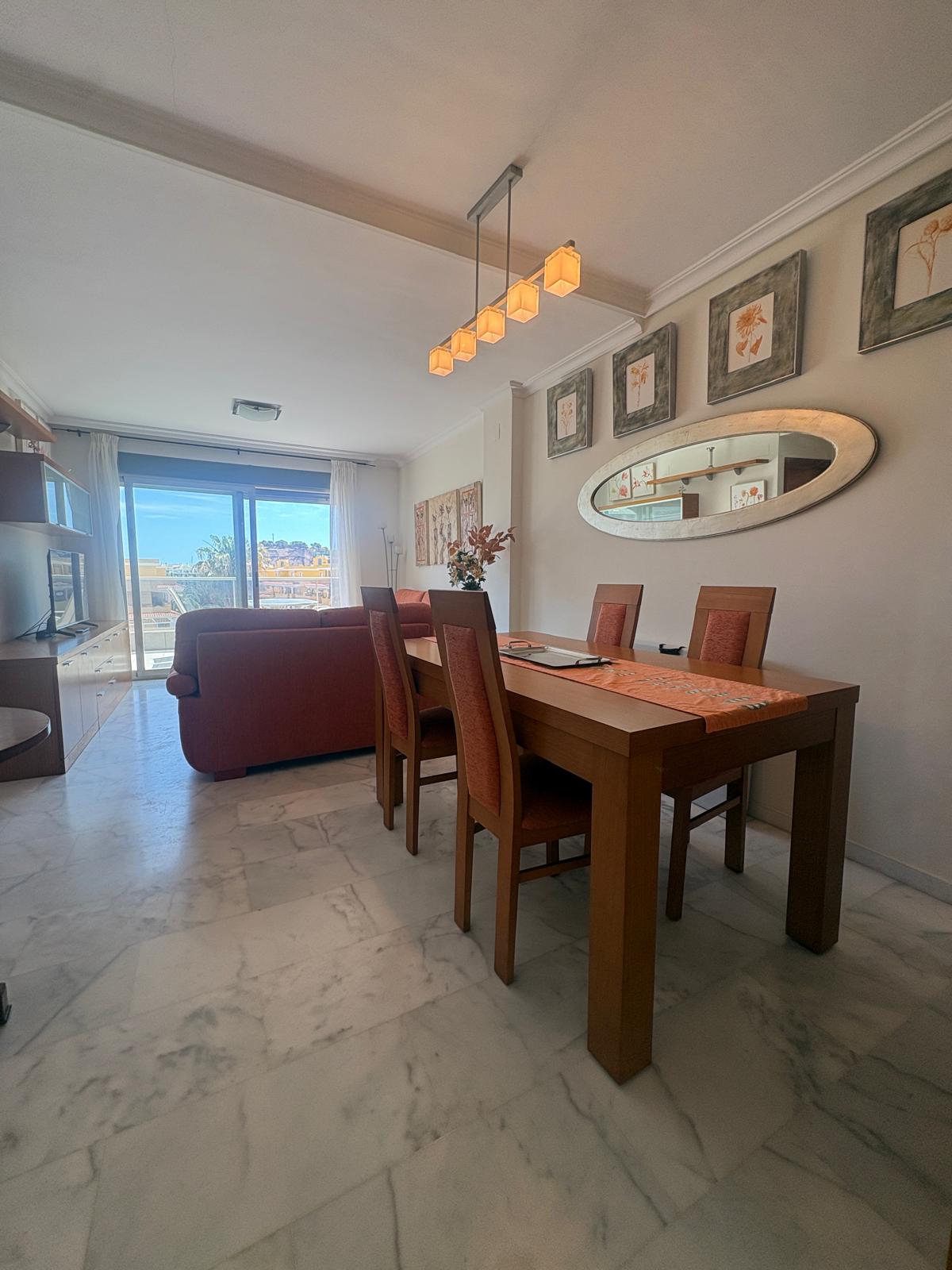 Living room in penthouse for sale in Denia