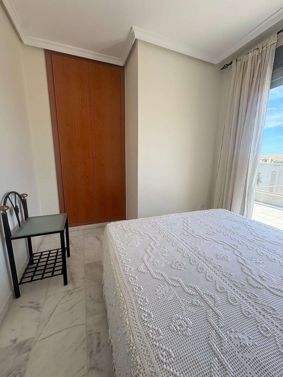 Master bedroom in penthouse for sale in Denia