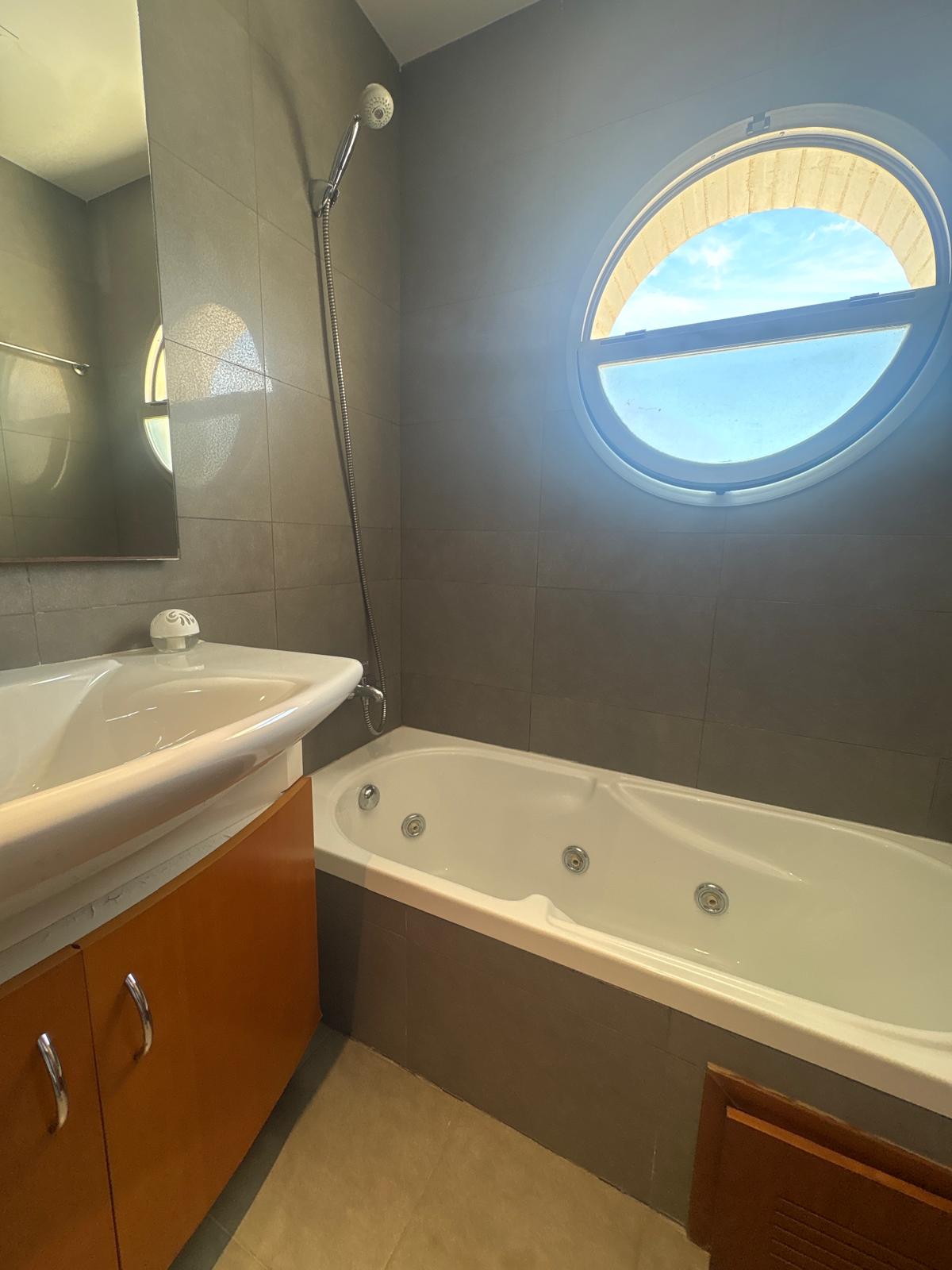 Living room in penthouse for sale in Denia