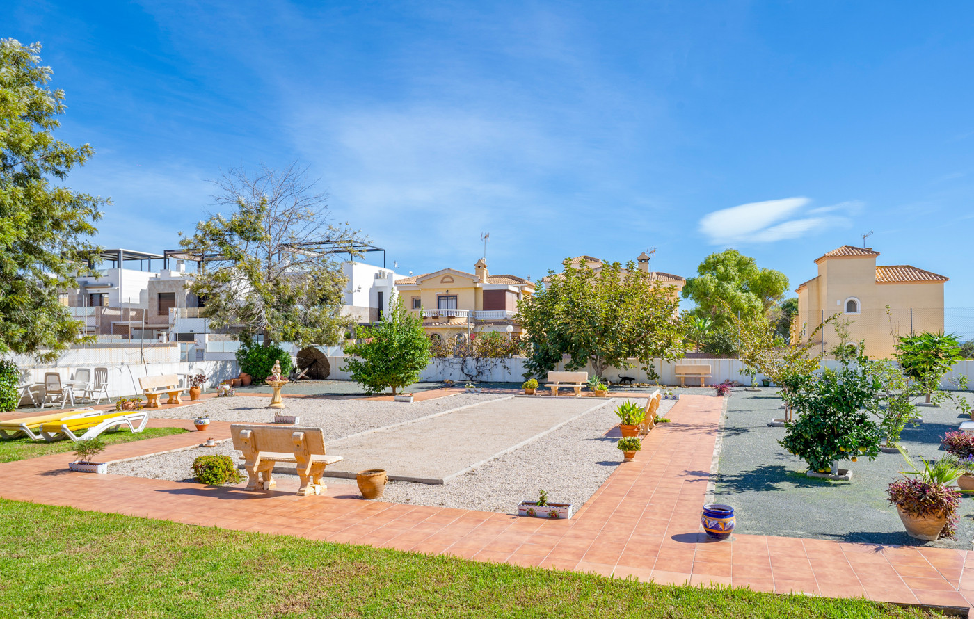 Living room in bungalow for sale in Cabo Roig