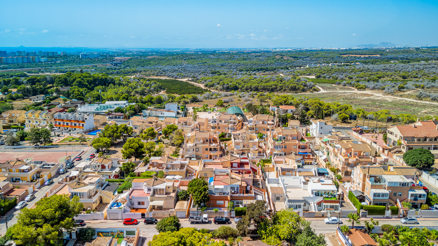 Pool area in bungalow for sale in Cabo Roig