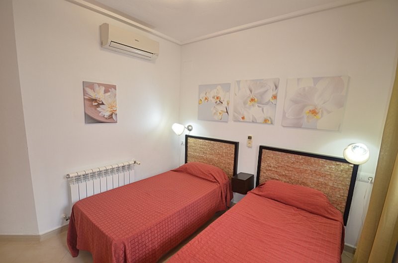 Master bedroom in apartment for sale in Hacienda Riquelme Golf Resort