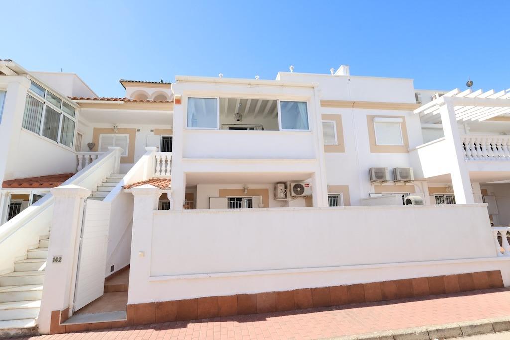 Zenia Mar III: 74 sqm ground-floor bungalow featuring a large 25 sqm paved terrace and garden with barbecue