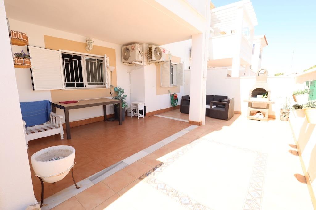 Zenia Mar III: 74 sqm ground-floor bungalow featuring a large 25 sqm paved terrace and garden with barbecue
