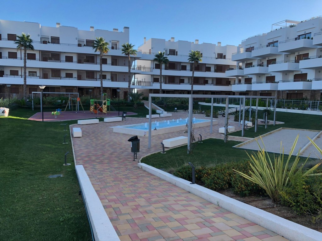 Pool area in apartment for sale in Cabo Roig