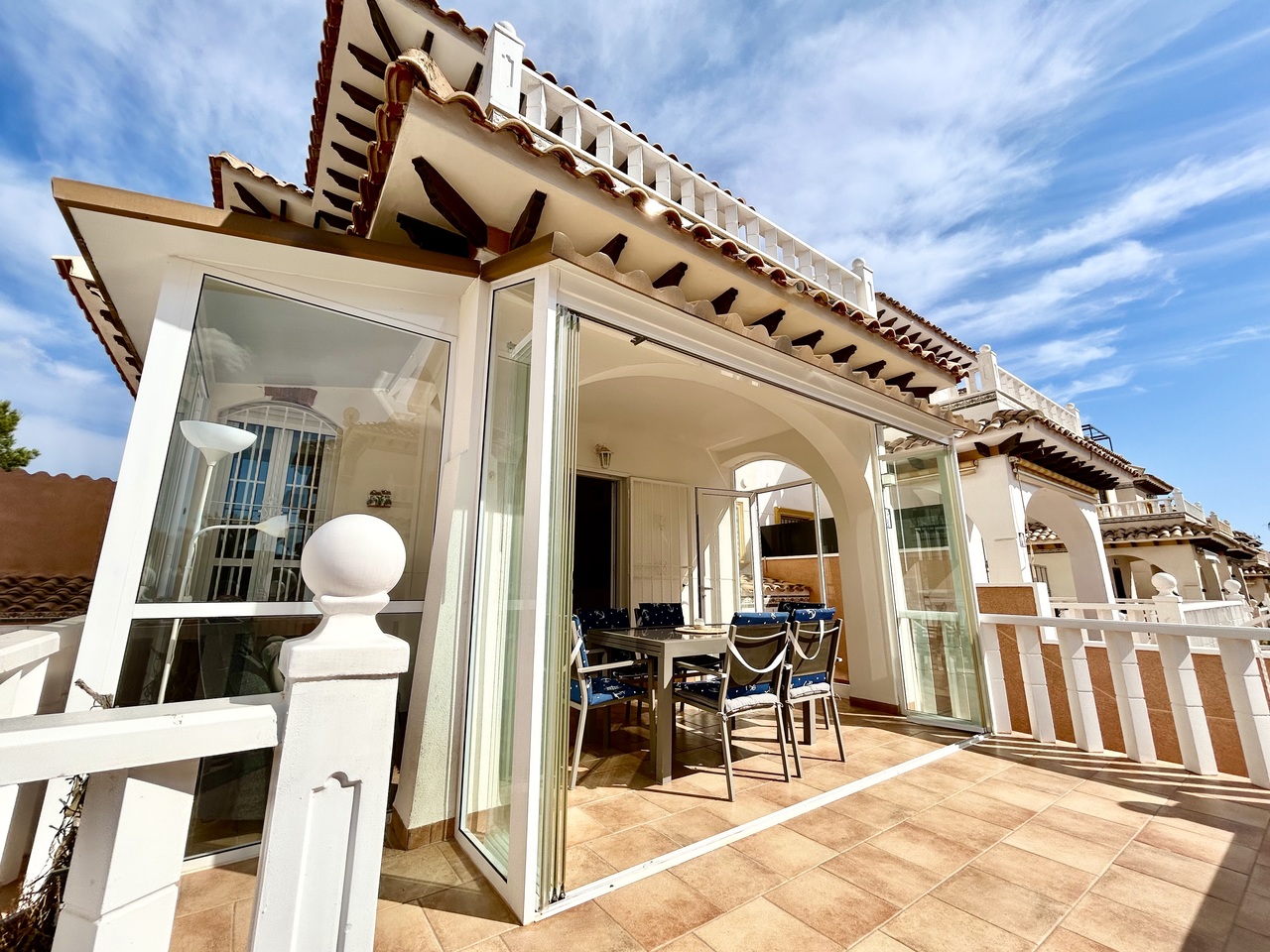 Set in the sought-after area of Lomas de Cabo Roig, this spacious and beautifully presented 2-bedroom, 2-bathroom quad townhouse offers a fantastic blend of comfort, outdoor living and stunning sea views