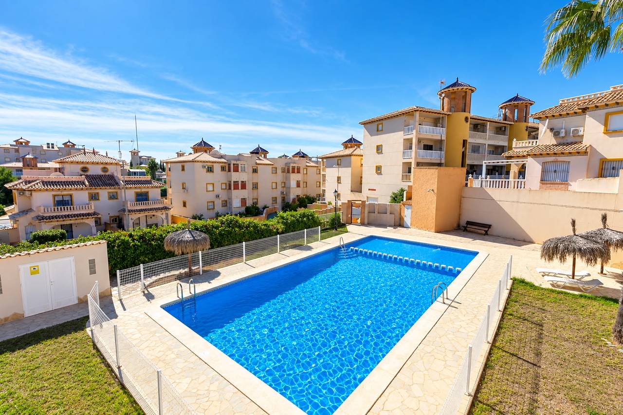 Set in the sought-after area of Lomas de Cabo Roig, this spacious and beautifully presented 2-bedroom, 2-bathroom quad townhouse offers a fantastic blend of comfort, outdoor living and stunning sea views