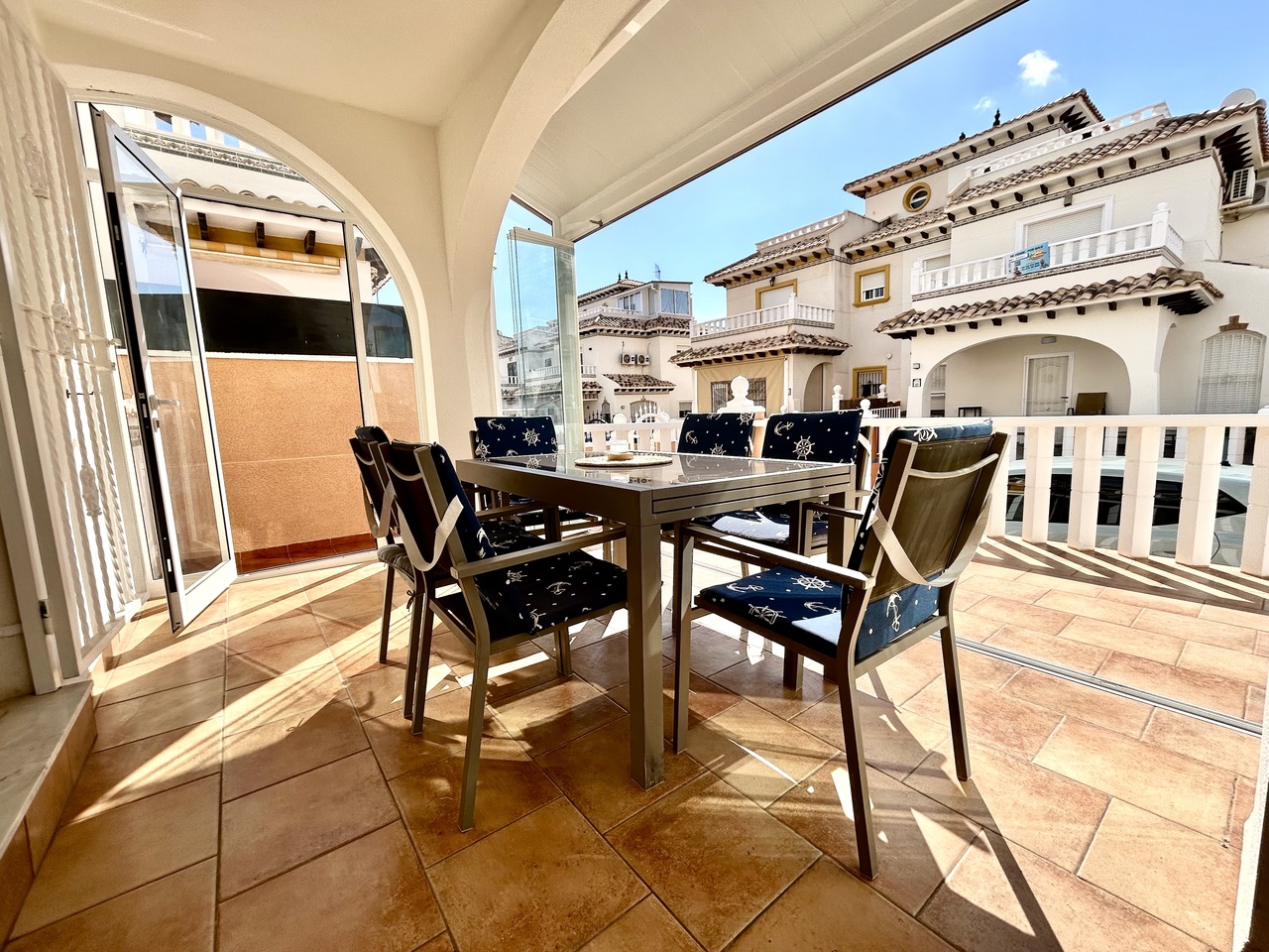 Set in the sought-after area of Lomas de Cabo Roig, this spacious and beautifully presented 2-bedroom, 2-bathroom quad townhouse offers a fantastic blend of comfort, outdoor living and stunning sea views