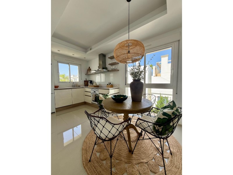 Living room in penthouse for sale in Rojales