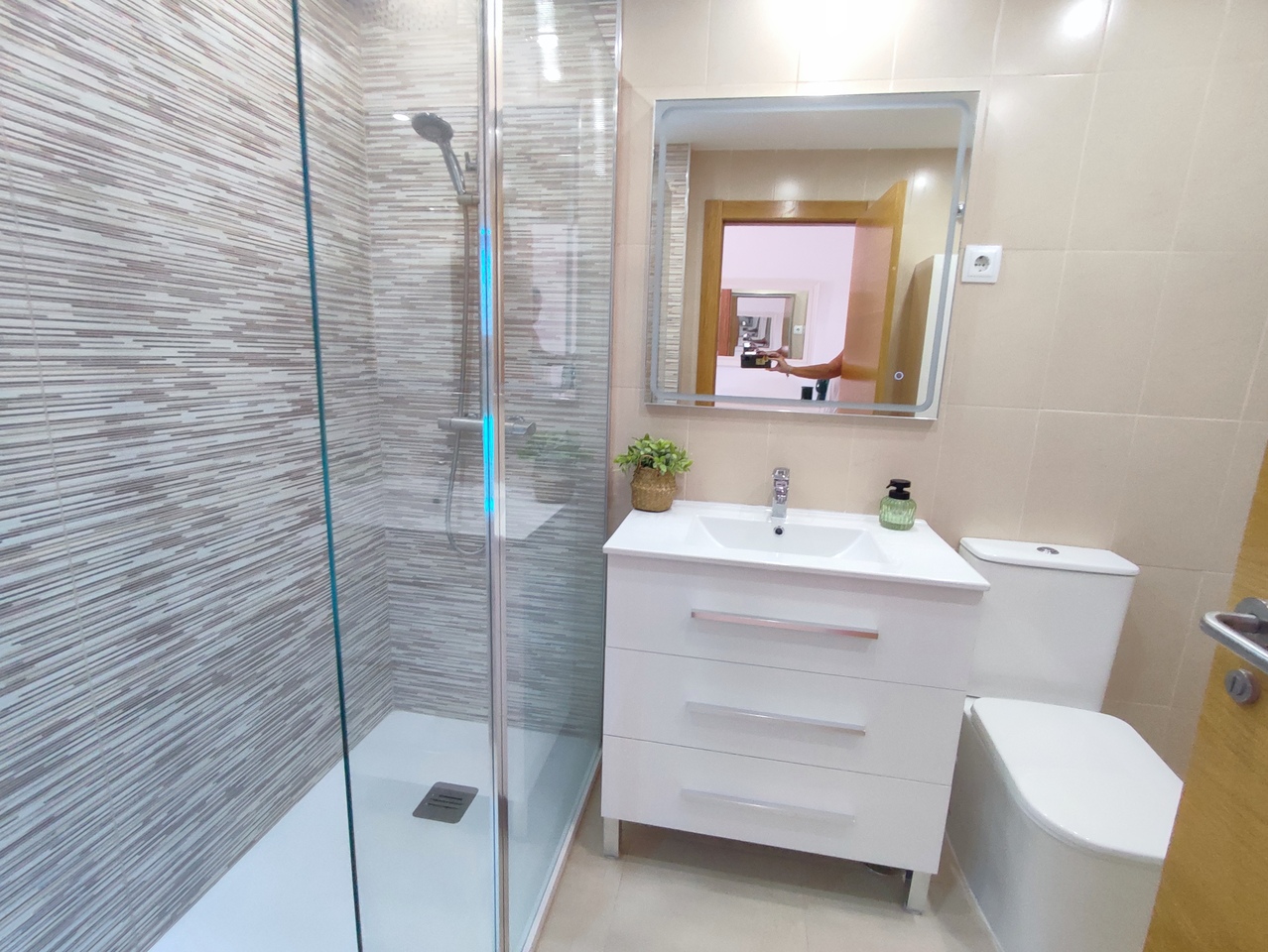 This popular curved wall design apartment has an attractive view of the swimming pool from its spacious terrace with pleanty of room for garden furniture and table & chairs