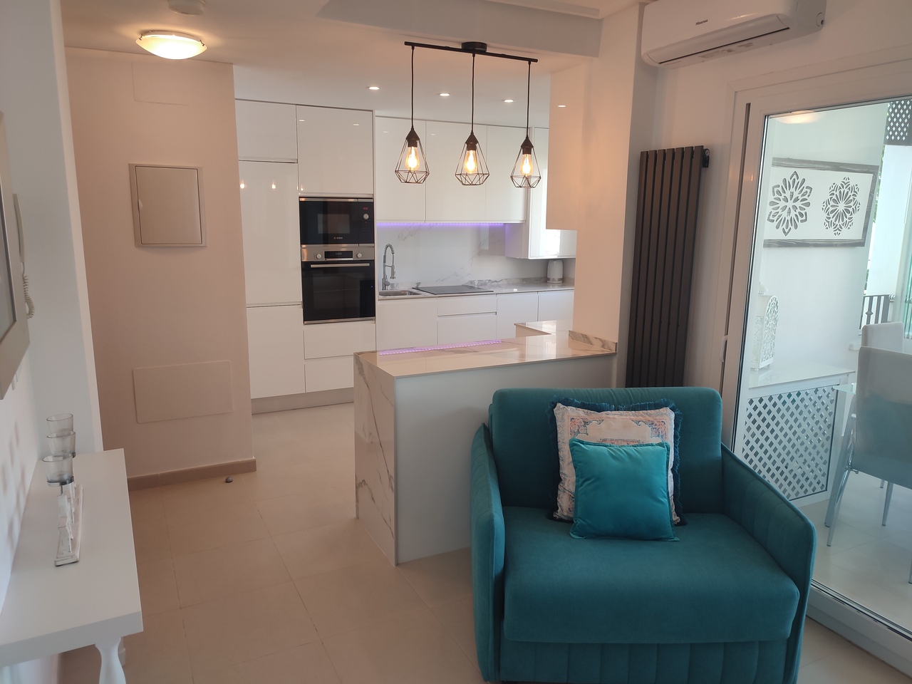 This popular curved wall design apartment has an attractive view of the swimming pool from its spacious terrace with pleanty of room for garden furniture and table & chairs