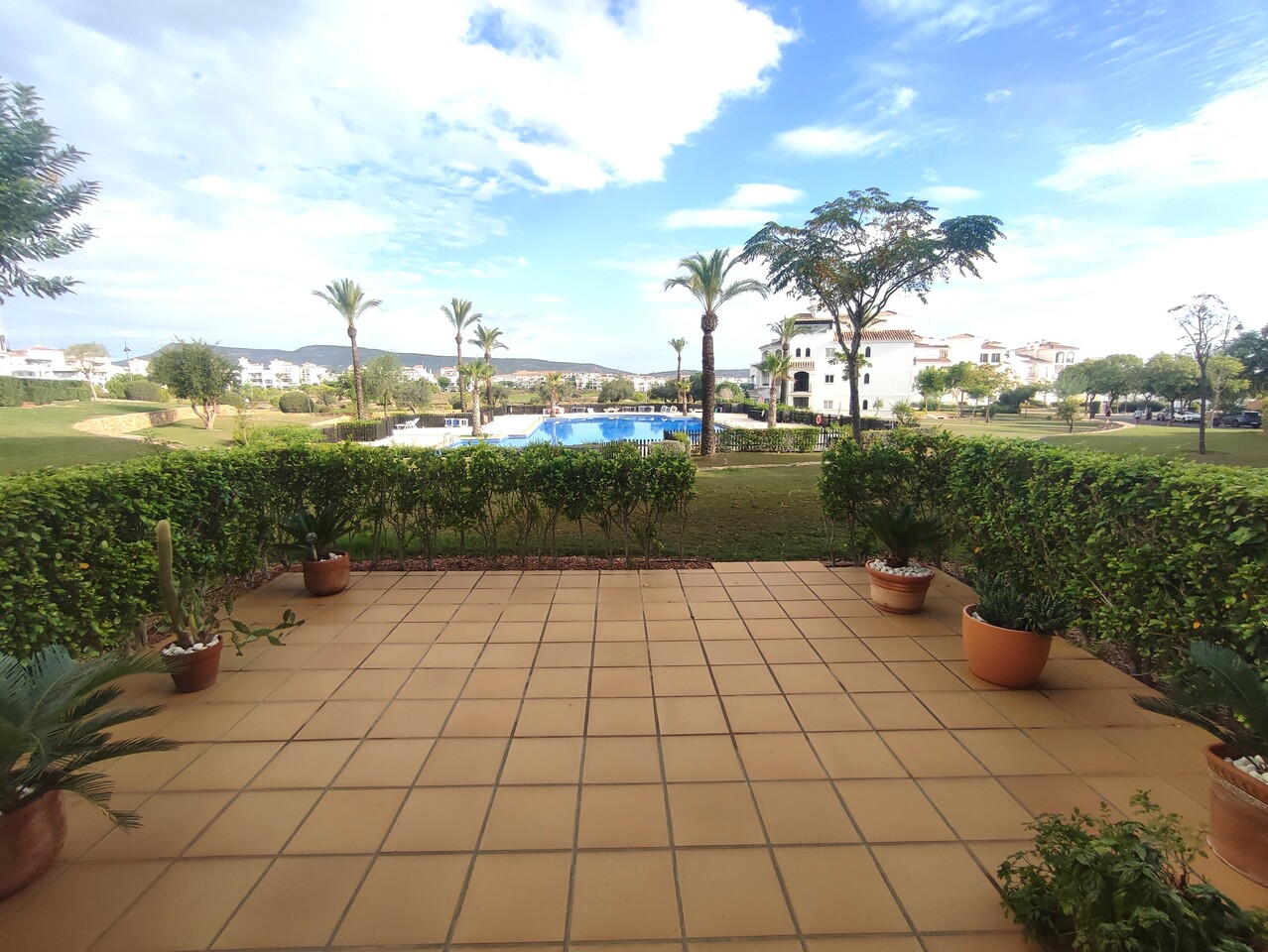 Pool area in apartment for sale in Hacienda Riquelme Golf Resort