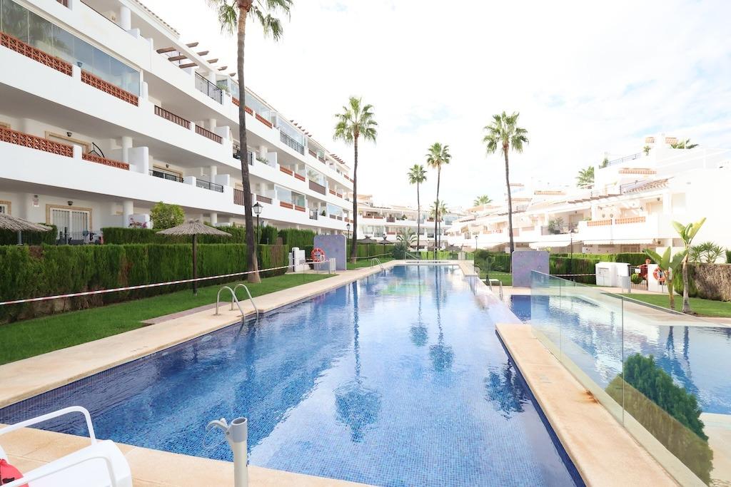 Pool area in apartment for sale in Orihuela Costa