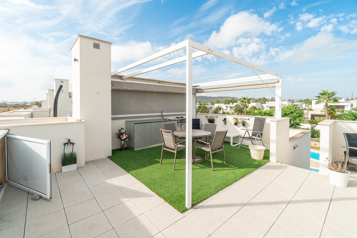 Pool area in bungalow for sale in Vistabella Golf Entre Naranjos