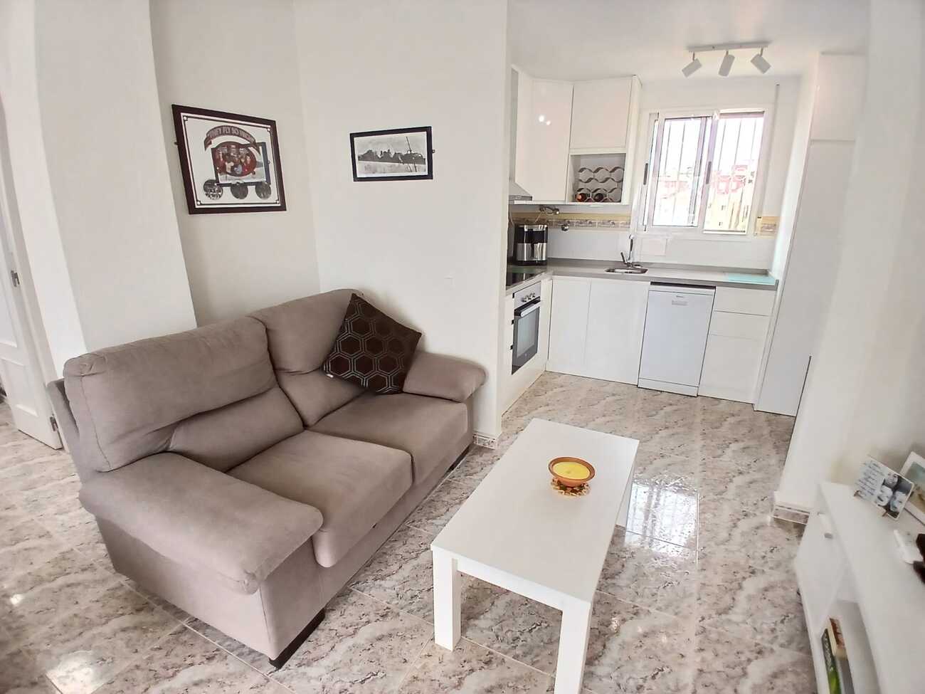 This beautifully renovated first-floor apartment is ideally situated in the sought-after area of Villamartin, offering a fantastic combination of modern comfort, convenience, and Mediterranean living